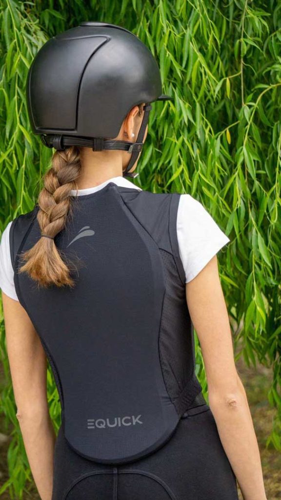 person with helmet and body protector